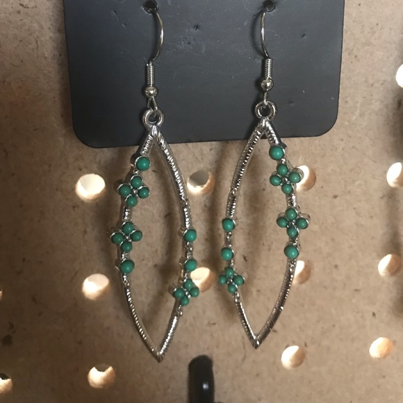 Slim silver earrings w/Kelly green beads.
